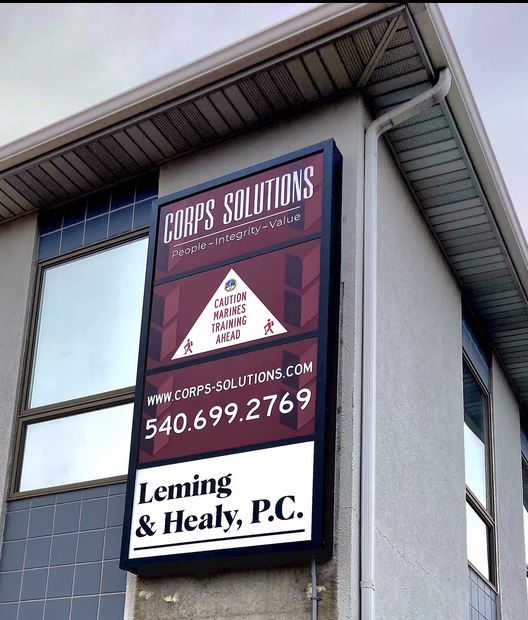 Corps Solutions’s building sign